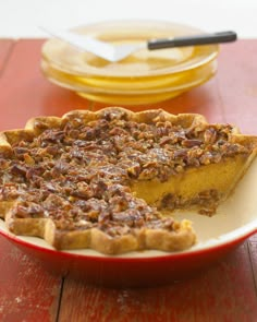 a pie sitting on top of a white plate