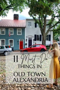 a woman standing in front of a blue house with the words 11 must do things in old town alexandria