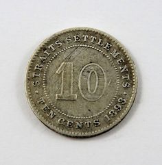 an old ten cents coin with the number ten on it