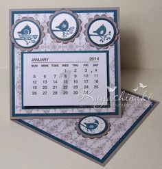 a calendar card with birds on it and the date in blue, white and gray