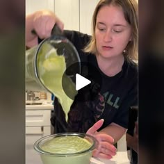 a woman pouring green liquid into a bowl