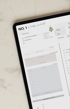 a tablet computer sitting on top of a table