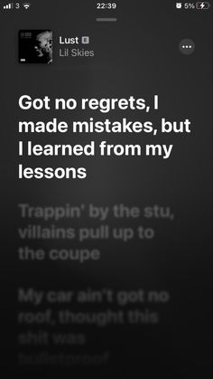 the text on the phone says,'got no regets, i made misstakes, but i learned from my lessons '