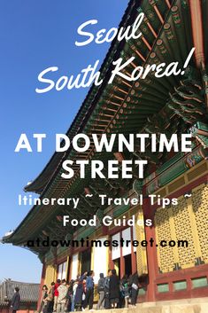 people standing in front of a building with the words seoul south korea at downtime street