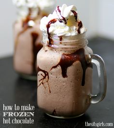 two glasses filled with hot chocolate and whipped cream on top of a table next to the words how to make frozen hot chocolate