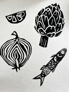 an image of artichokes and fish on white paper with black pen drawing