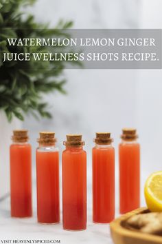 lemon ginger juice in small bottles next to sliced lemons and crackers with text overlay