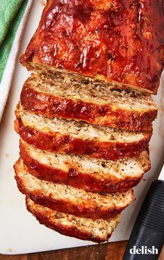 slices of meatloaf on a cutting board