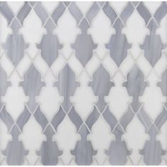 a white and blue tile pattern with an intricate design