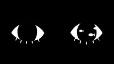 two eyes are shown in the dark