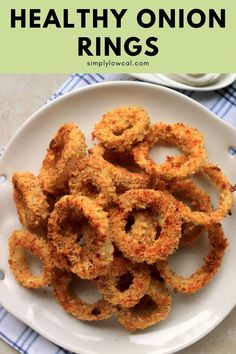 onion rings on a white plate with the words healthy onion rings above it and below