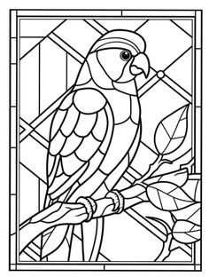 a bird sitting on top of a tree branch in front of a stained glass window