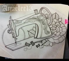 a drawing of a sewing machine on paper