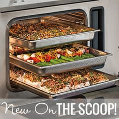 three trays of food are stacked in an oven with the words new on the scoop