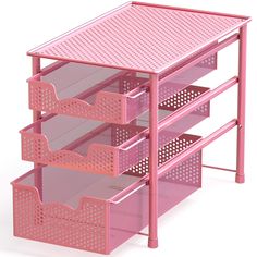 three pink drawers are stacked on top of each other