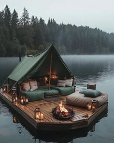 a tent is set up on top of a dock