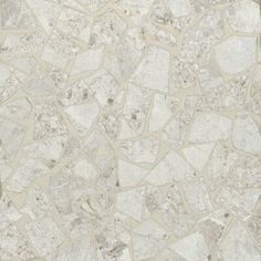 an image of a stone wallpaper with white and beige colors on it's surface