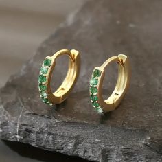 Brand New Women's Small Gold & Emerald Hoop Earrings 18k Yellow Gold Plated Sterling Silver Genuine 1ct Natural Green Emerald Gemstones .4" Size Retail Price $295 Buy With Confidence From A Top Rated Seller W/ A 99%+ Feedback Rating! A0396 (Id-699-) Small Huggie Hoop Earrings, Simple Emerald Earrings, Emerald Hoop Earrings, Green Huggie Earrings With Prong Setting, Green Hoop Earrings With Prong Setting, Anniversary Huggie Earrings With May Birthstone, Anniversary Gift May Birthstone Round Huggie Earrings, Gold Hoop Earrings For Anniversary With May Birthstone, Gold Hoop Earrings For Anniversary, May Birthstone