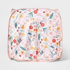 a pink and yellow floral print baby changing bag