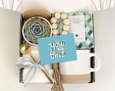 a gift box with coffee, cookies and other items for someone's special occasion