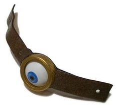 an eyeball is attached to a leather strap