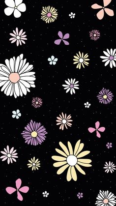 a bunch of different colored flowers on a black background with white and pink dots in the middle