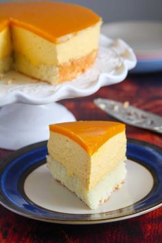 a piece of mango mousse cake on a plate