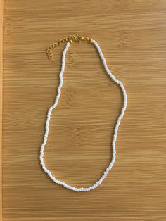 white seed bead necklace. age size, 9yrs - 24yrs. waterproof beaded necklace handmade with love by Addi. White Minimalist Beaded Bracelets For Summer, Minimalist White Beaded Bracelets For Summer, White Strand Jewelry As Gift, Everyday White Single Strand Beaded Necklace, White Strand Jewelry Gift, Everyday Adjustable White Necklaces, Everyday Adjustable White Necklace, White Single Strand Beaded Bracelet For Gift, White Handmade Strand Jewelry