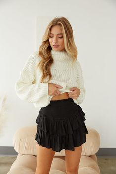 Black smocked ruffle shorts