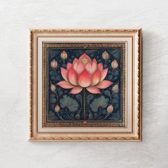 a painting hanging on the wall above a framed art piece with water lilies and leaves