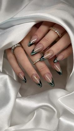 French Green Christmas Nails, His And Her Matching Nails, Chrome Abstract Nails Designs, Green Cat Eye Nails Christmas, Almond Cat Eye French Tip Nails, New Years Nail Designs Cat Eye, Nye French Tip Nails, Nail Inspo That Goes With Everything, Gel X Nail Designs Green