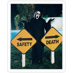 a man dressed in a ghost costume standing next to two street signs that say doctor who and shelock