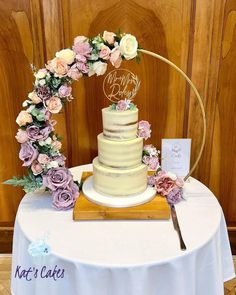 a wedding cake sitting on top of a table