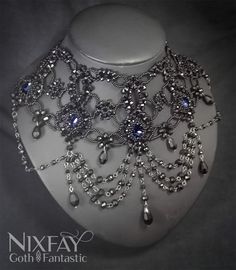 If you like unique, durable and shiny jewelry, this necklace is for you!  Each rhinestone is carefully bezelled by me, using Preciosa czech crystal beads, rondelles, bicones and a whole lot of love. I'm open to changes you might want to suggest, as the design is my own. Color of the stones can be customized as well as drops and type of closure, feel free to ask! This handmade statement necklace is also adjustable, featuring two clasps with extra chain for a better fit (you can adjust both the upper and lower segments depending on your needs) Medieval Bride, Ethereal Jewelry, Goth Victorian, Victorian Accessories, Handmade Statement Necklace, Shoulder Necklace, Shiny Jewelry, Goth Necklace, Victorian Necklace