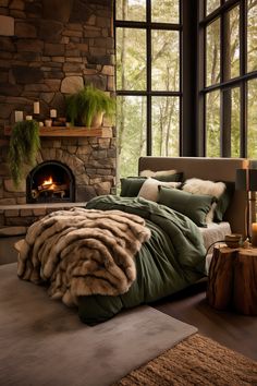 a bedroom with a stone fireplace and large bed covered in green comforter next to a window