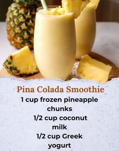 a pineapple smoothie is served in two glasses