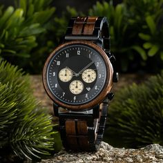 "Welcome to our Wooden Watch store, your go-to destination for personalized gifts, ideal for Father's Day and Mother's Day celebrations. Shipping Information: Due to high demand, our standard processing time is extended by 3 to 7 days. Expedite your order with Express Shipping for an additional $20. With DHL Express, expect delivery within 3-5 days worldwide. Thank you for your patience and trust. Engraving Information: Personalize your gift with free engravings on the watch and wooden box lid. Simply send us your desired engraving details, and within 24 hours, we'll provide a digital design for approval. Key Features: Classic walnut wood and silver chronograph combo. Free engraving for a personalized touch. Japanese Miyota mechanism for precise timekeeping. Adjustable strap for comfort. S Anniversary Present, Wooden Watch, Ebony Wood, Engraved Wood, Wristwatch Men, Wrist Watches, Wooden Box, Wood Watch, Dhl Express