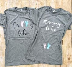 two t - shirts with the words mommy to be and baby feet printed on them