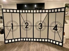 a room divider with numbers and arrows on it