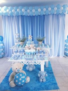 a blue and white teddy bear themed baby shower