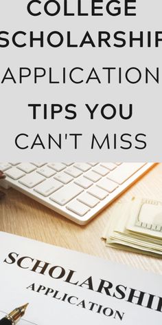 a college application sitting on top of a wooden desk next to a keyboard and money