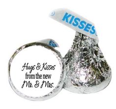 two herss kisses with the words hugs and kisses from the new mr and mrs