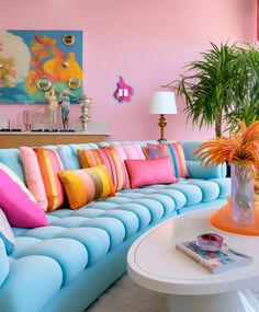 a living room filled with lots of colorful pillows