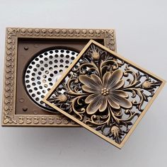 two decorative objects are sitting in a box