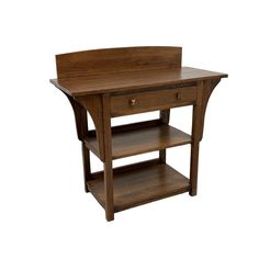 a small wooden table with two drawers on one side and an open shelf on the other