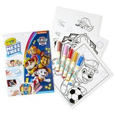 the coloring book and markers are next to it's contents, which include an image of paw patrol