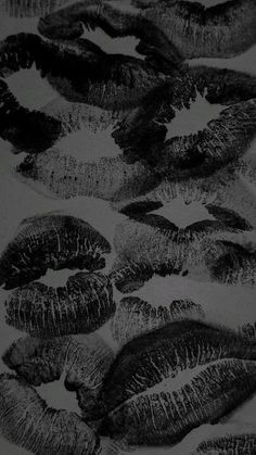 black and white photograph of many different types of lips