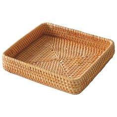 a square wicker tray on a white background