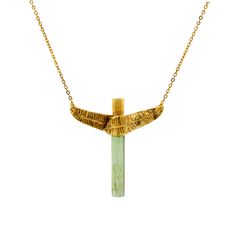 This gorgeous banana leaf necklace hits the perfect tropical note – set with a green tourmaline stick, each one completely unique in shape and size so will truly have a one of a kind necklace*.Banana leaf pendant comes on a delicate 18” – 20” chain so you can wear it at either length.Made from recycled sterling silver, which is thne heavily overlaid with 18ct gold vermeil.100% handmade in Hatton Garden, London from recycled silver.   Comes beautifully packaged in a Lee Renee Branded box.*Each st