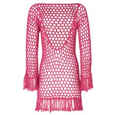 a pink crocheted dress with fringes